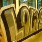 Un vagón de tren con grafitis que fueron denunciados a los Mossos.