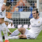 Gareth Bale, junto a su compañero Cristiano Ronaldo cuando sufrió la lesión ante el Sporting.