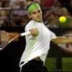 Federer supo sufrir ante Davydenko para meterse en su séptima semifinal de Grand Slam consecutiva