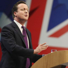 Cameron interviene durante el congreso del Partido Conservador que se celebra en Manchester.