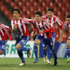Jugadores de Paraguay celebran su pase a la gran final.