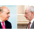 Jorge Fernández Díaz, ministro del Interior, y Rodrigo Rato, exvicepresidente del Gobierno y exministro de Economía.