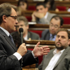 Mas ante Junqueras, en una imagen de archivo.