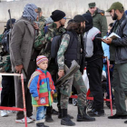 Varias familias son evacuadas de la ciudad siria de Homs. SANA HANDOUT