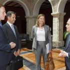 Los responsables del BBVA, con los consejeros de Economía y Hacienda, ayer, en Valladolid.