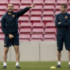 El técnico del FC Barcelona, Josep Guardiola, junto al segundo entrenador, Tito Vilanova.