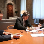 Carles Puigdemont y Oriol Junqueras reciben la notificación del TSJC.