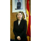 La nueva secretaria de Estado posa delante de la bandera de España