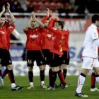 Los jugadores del Mallorca celebran la victoria ante el Valencia