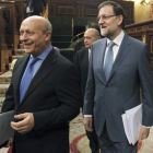 Wert y Rajoy, durante la sesión de control al Ejecutivo.