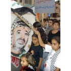 Niños palestinos se manifiestan en contra del cerco israelí a Arafat