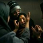 Una mujer palestina llora la muerte de su marido a manos del Ejército israelí