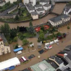 Efectos del paso de una riada por un pueblo de Lugo.