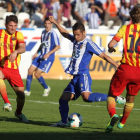 Acorán trata de recortar a un jugador del equipo catalán en el partido de la primera vuelta.