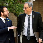 El vicepresident catalán Pere Aragonès y Quim Torra. TONI ALBIR