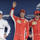 Valtteri Bottas (2º), Sebastian Vettel (1º) y Kimi Raikkonen (3º), en los últimos ensayos hoy del GP de Alemania. /