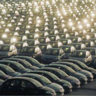 Coches a la espera de su distribución en concesionarios en el puerto de Tarragona.