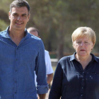 El presidente y la canciller, en la visita de ésta a Doñana.