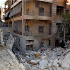 Ruinas de un edificio de Alepo tras un ataque con cohetes en el mes de junio