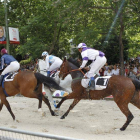 Un momento de la celebración de las carreras de caballos, esta mñana en la Castellana de Madrid.