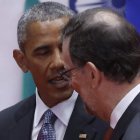 El presidente de EE UU, Obama, conversa con Rajoy durante la cumbre del G-20. JUAN CARLOS HIDALGO