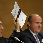 El secretario general de la OCDE, Ángel Gurría, y el ministro de Economía en funciones, Luis de Guindos, en una imagen de archivo.