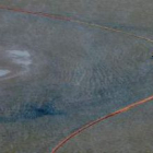 Una de las barreras de protección instaladas alrededor de una pequeña isla en Port East para el crud