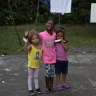 Tres niños cubanos esperan en un refugio de Panamá antes de intentar entrar en EEUU.