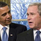 Obama y el presidente Bush.