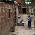Unos niños en el barrio de Petare, en Caracas.