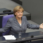 La canciller alemana, Angela Merkel, participa en el debate y votación del tercer rescate a Grecia.