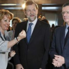Esperanza Aguirre, Mariano Rajoy y Alberto Ruiz-Gallardón, en la jornada de ayer.