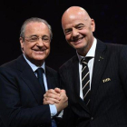 Gianni Infantino y Florentino Pérez, celebrando juntos la reelección del primero.