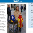 Caputra de pantalla de la entrevista en formato digital en la que la candidata por Lleida del PP, Marisa Xandri, se fotografió lanzando una estelada a la papelera.