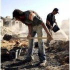 Trabajadores palestinos en la construcción de un asentamiento judío