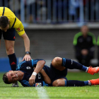 Cristiano Ronaldo se duele en el suelo de un golpe durante el Málaga-Real Madrid. daniel pérez