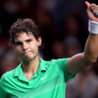 El tenista español Rafael Nadal celebra su triunfo por 7-5 y 7-5 frente al francés Tsonga .