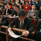 Los delegados de la Asamblea Nacional Popular china participan en la apertura anual de la institución, este domingo en Pekín.