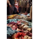 En la imagen, los cadáveres de las víctimas de la masacre de Ishaqi