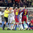 El clásico acabó con el empujón-agresión de Sergio Ramos sobre Carles Puyol.