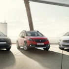 Tres vehículos del grupo PSA, Citroën, Peugeot y DS.