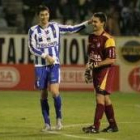 Los dos hombres fundamentales para el triunfo blanquiazul se felicitan mutuamente a la conclusión