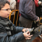 Un niño lleva a bendecir a su pajarito en San Marcelo