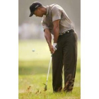 Tiger Woods en acción en la primera jornada en el Baltusrol Golf Club
