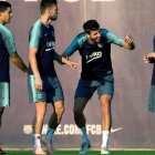 Suárez, Rakitic, Piqué y Messi, durante un entrenamiento del Barcelona. ENRIC FONTCUBERTA