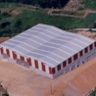 Una perspectiva aérea de la planta de agua mineral de Leche Pascual en La Ribera de Folgoso