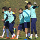 Carles Puyol, Martín Montoya, Jordi Alba y Jordi Oller, durante la sesión de trabajo de ayer.