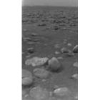 Una de las imágenes de Titán, donde se aprecia su superficie rocosa