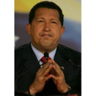 Chávez comenta con Bachelet y el Rey en un receso previo al incidente