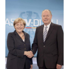 Angela Merkel y Peer Steinbrück en el debate televisado ayer.